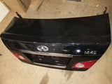 06 07 INFINITI M45 4DR SEDAN BLACK DECK TRUNK LID LIP COVER NICE