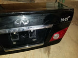 06 07 INFINITI M45 4DR SEDAN BLACK DECK TRUNK LID LIP COVER NICE